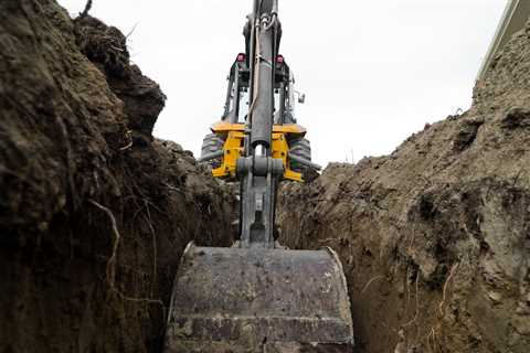 Contractor, Equipment Operator Charged with Manslaughter after Trench Death