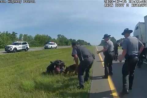 Ohio officer put on paid leave amid probe into releasing K-9 on surrendering truck driver