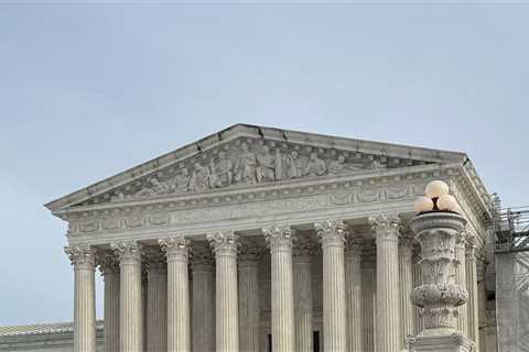 Trump asks justices to lift judge’s order pausing mass federal layoffs